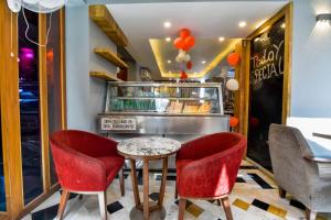 Posezení v ubytování Naivara Boutique Hotel