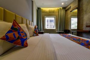 Postel nebo postele na pokoji v ubytování Naivara Boutique Hotel + 37 fotografií