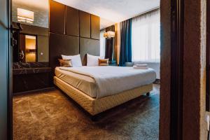 Postel nebo postele na pokoji v ubytování HOTEL CIAO