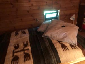 Ein Bett oder Betten in einem Zimmer der Unterkunft Haus im Grünen Wildpark