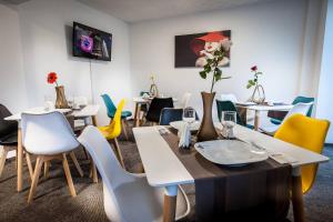 TV a/nebo společenská místnost v ubytování HOTEL CIAO