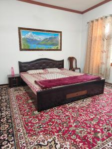 Letto o letti in una camera di Mir manzil