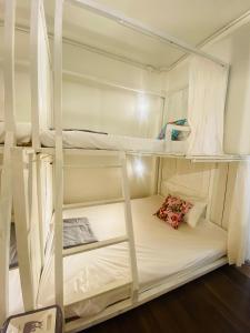 Ein Bett oder Betten in einem Zimmer der Unterkunft Chiza hostel Chiangmai