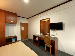 TV o dispositivi per l'intrattenimento presso Cool Point Hotel