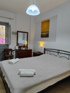 Postel nebo postele na pokoji v ubytování Sidra Hotel
