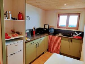 Η κουζίνα ή μικρή κουζίνα στο Charmant studio, plein sud, sport et relax +6 φωτογραφίες