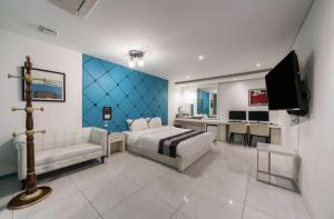 TV a/nebo společenská místnost v ubytování Hotel Cube
