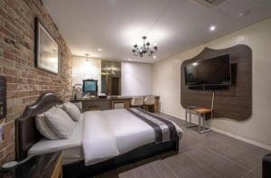 TV a/nebo společenská místnost v ubytování Hotel Cube