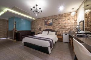 Postel nebo postele na pokoji v ubytování Hotel Cube
