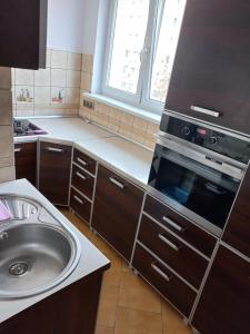 Dapur atau dapur kecil di Gdańsk Stogi - mieszkanie w pobliżu plaży