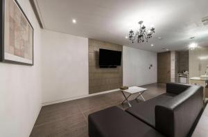 TV a/nebo společenská místnost v ubytování Hotel Cube
