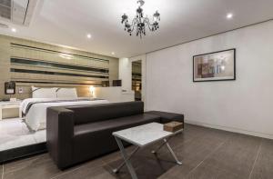 Postel nebo postele na pokoji v ubytování Hotel Cube