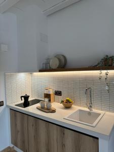 Кухня или мини-кухня в KAUKABA-Apartamentos Rurales- Adults Only
