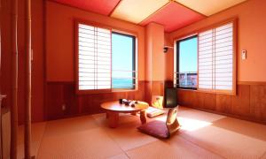 Зображення з фотогалереї помешкання Ryokan KINOSUKE hotel きの助 日間賀島 島のサウナ Himaka Island у місті Мінамі-Чіта