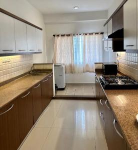 Η κουζίνα ή μικρή κουζίνα στο 3bhk in Agartala
