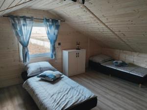 Postel nebo postele na pokoji v ubytování Harmony Time