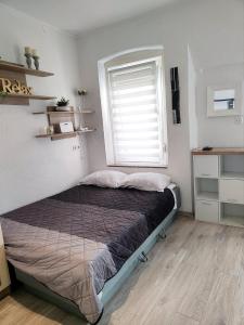 Posteľ alebo postele v izbe v ubytovaní Studio Placa