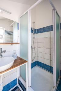 a bathroom with a shower and a sink at Apartment Jessica in Korčula