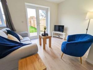 Μια τηλεόραση ή/και κέντρο ψυχαγωγίας στο 3-Bed, Sleeps 6, 3 Bath, Parking, WiFi