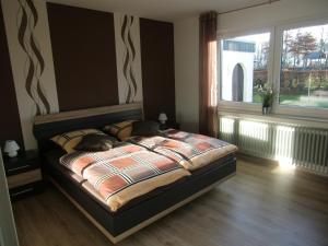 Postel nebo postele na pokoji v ubytování Ferienhaus-Eicherscheid