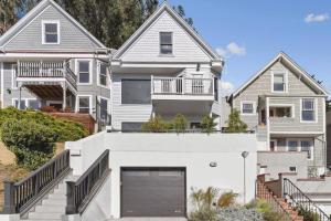 a house with a garage in front of it at Elegant 3BR House San Francisco in San Francisco