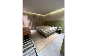 Ένα ή περισσότερα κρεβάτια σε δωμάτιο στο Serviced Apartment, North coast
