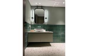 Ένα μπάνιο στο Serviced Apartment, North coast