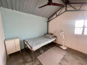 Postel nebo postele na pokoji v ubytování Malavembu Kaadu Resort