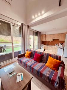Χώρος καθιστικού στο Complejo de apartamentos, áticos y Dúplex vacacionales Empul Caños de Meca