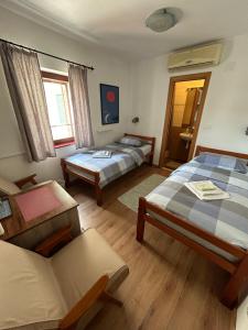 Voodi või voodid majutusasutuse Guesthouse Fjaka toas