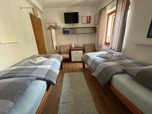 Voodi või voodid majutusasutuse Guesthouse Fjaka toas