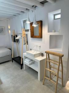 a bathroom with a sink and a bunk bed at Apollonion house in Apollonia
