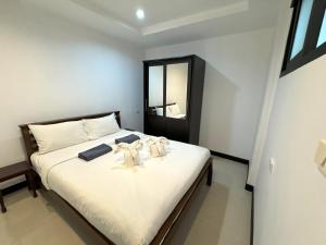 Ένα ή περισσότερα κρεβάτια σε δωμάτιο στο Patong Tower apartment by Lofty