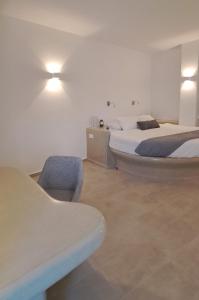 Un pat sau paturi într-o cameră la Pegasus Spa Hotel