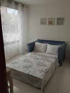 Postel nebo postele na pokoji v ubytování Ermionis home