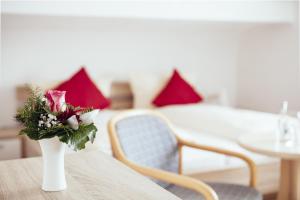 Posezení v ubytování KAISERS das kleine Stadthotel