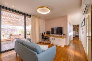 TV a/nebo společenská místnost v ubytování כרמל במדבר