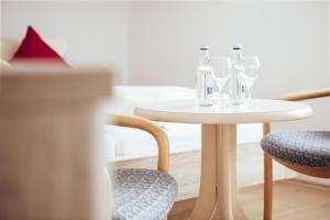 Posezení v ubytování KAISERS das kleine Stadthotel