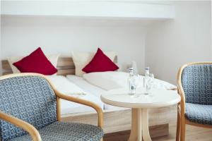 Posezení v ubytování KAISERS das kleine Stadthotel