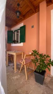 A television and/or entertainment centre at ''Korifo apartment'' at Benitses