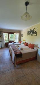 Katil atau katil-katil dalam bilik di Hotel Risco Plateado Room & Suite