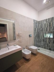 Koupelna v ubytování Cattaro 65 - Flexible Check-in apartments + 36 fotografií