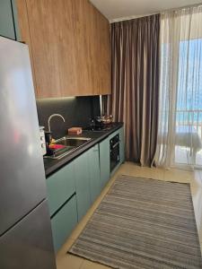 Foto dalla galleria di Palase Jacuzzi apartment 157-D GC a Llogara