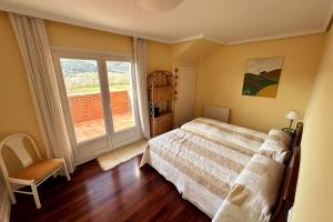 Postel nebo postele na pokoji v ubytování Fantástica Casa en Ampuero