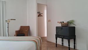 Letto o letti in una camera di Casa Iola