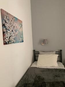 Postel nebo postele na pokoji v ubytování Guesthouse Corali