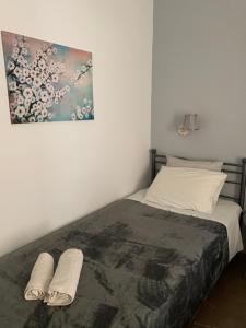 Posteľ alebo postele v izbe v ubytovaní Guesthouse Corali