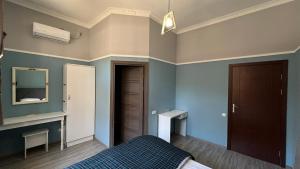 Voodi või voodid majutusasutuse Ivy Boutique Hotel toas