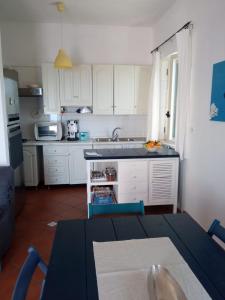 Kuchyň nebo kuchyňský kout v ubytování Ambrosio home