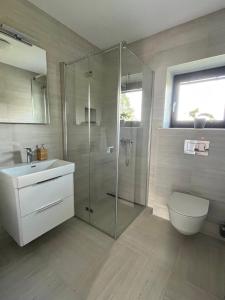Kúpeľňa v ubytovaní Sáňky Apartmány